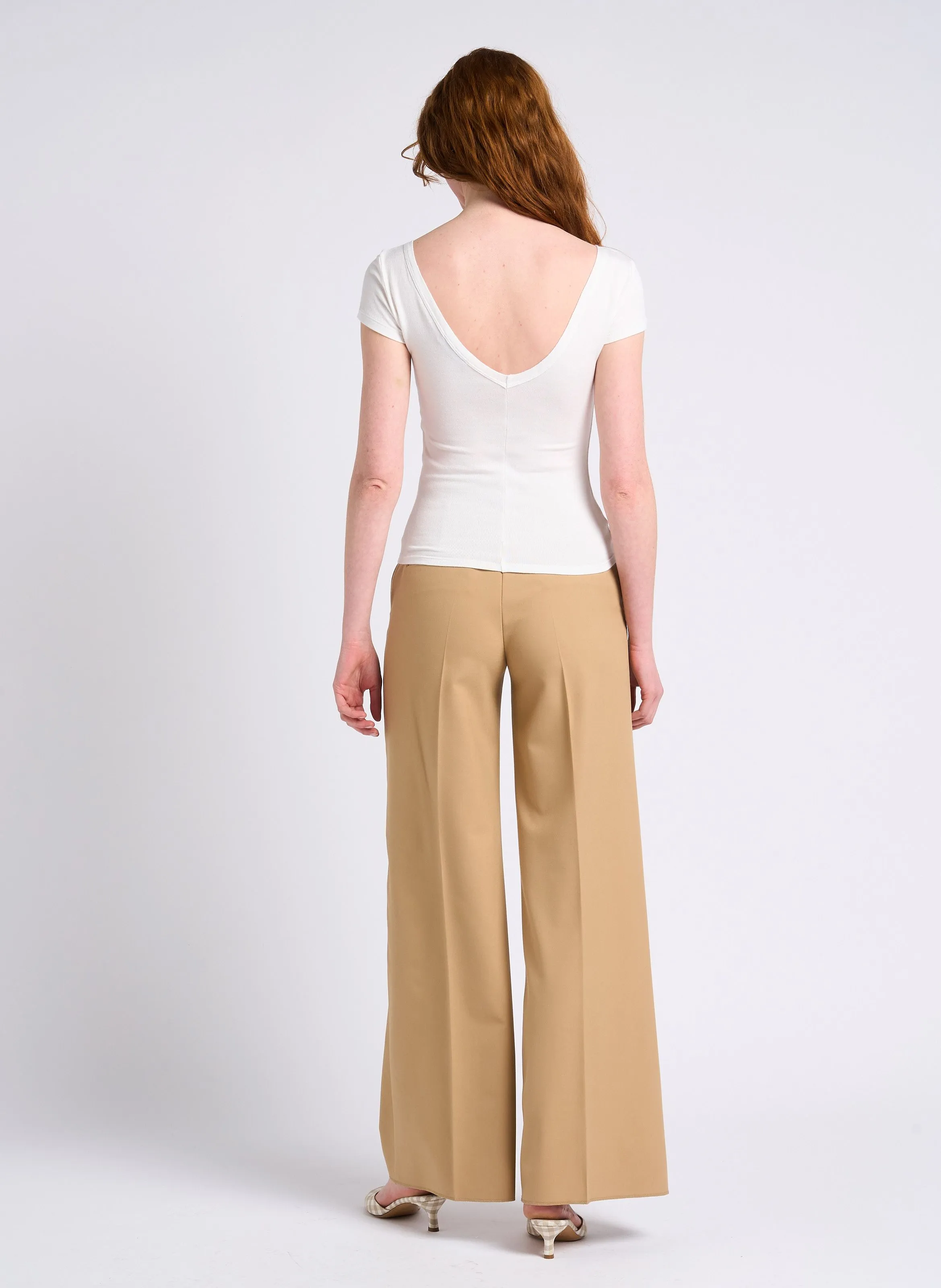 CARONTE - Pantalón de talle alto con pinzas y bordes sin rematar en beige